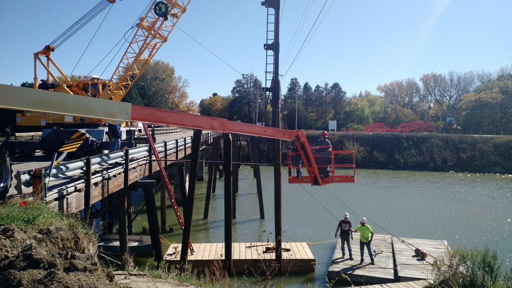 Central personnel finish driving the last steel piling for the pedestrian bridge.