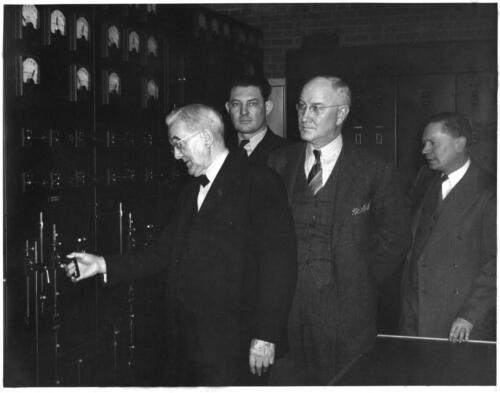 Senator George Norris pulls the controls to bring Jeffrey Hydroplant online for the first time on Jan. 5, 1941